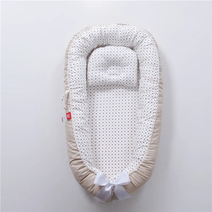 Réducteur de lit bébé 85x50cm