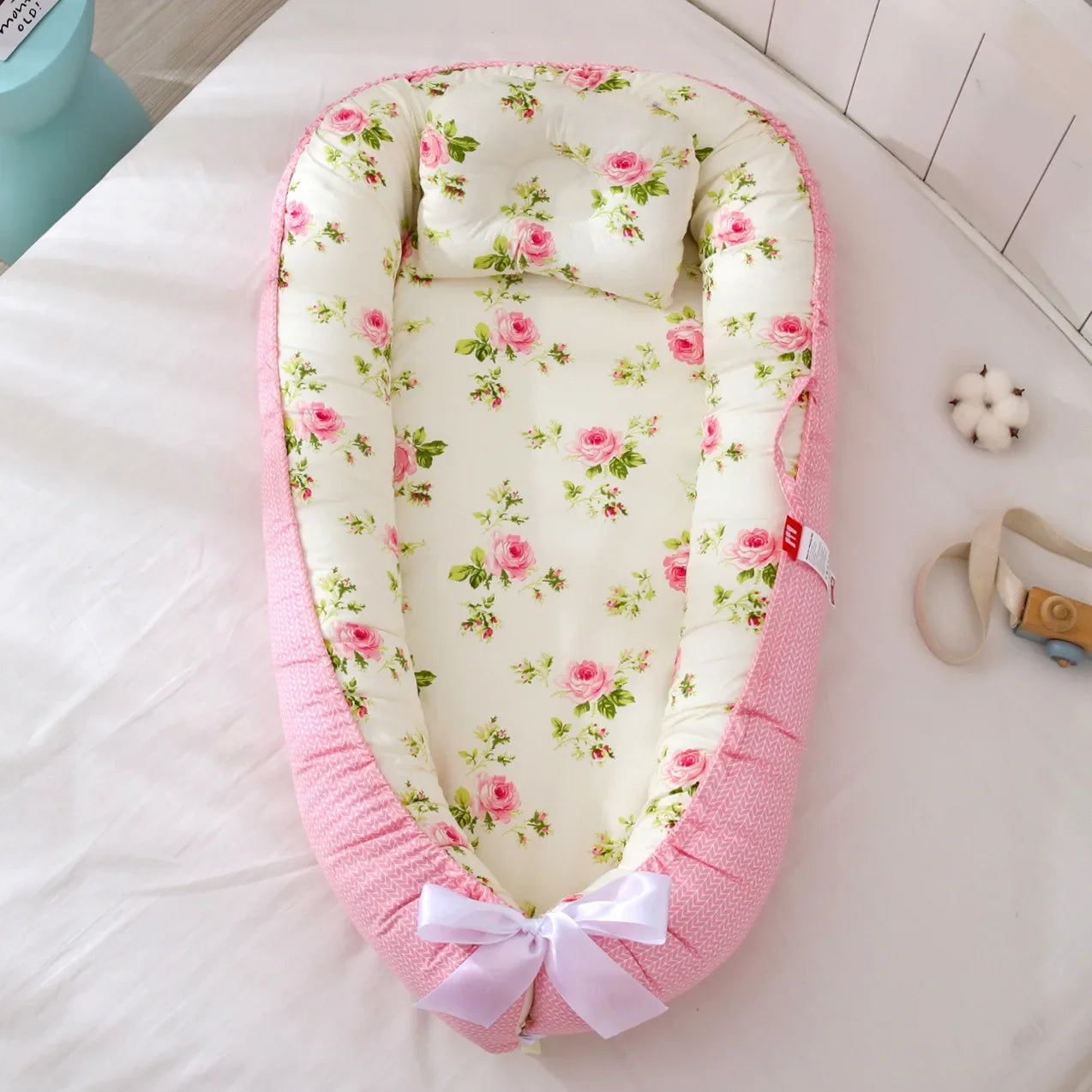 Réducteur de lit bébé pour voyage