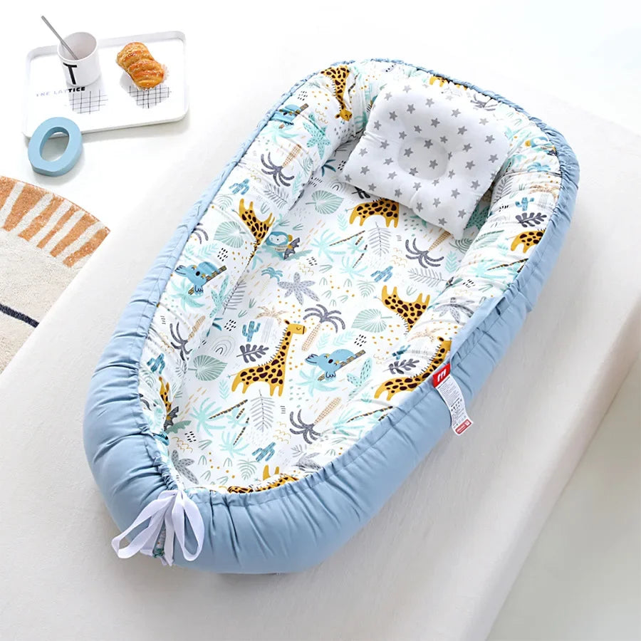 Réducteur de lit bébé pour voyage