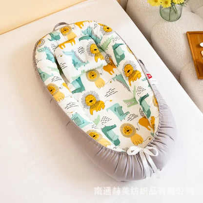 Réducteur de lit bébé pour voyage