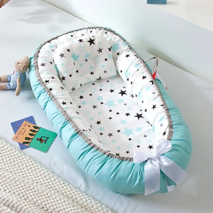 Réducteur de lit bébé pour voyage