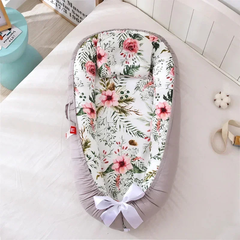 Réducteur de lit bébé pour voyage