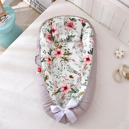 Réducteur de lit bébé pour voyage