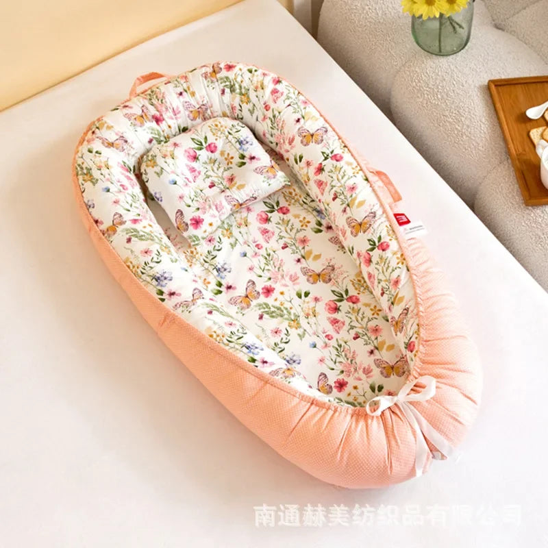 Réducteur de lit bébé pour voyage