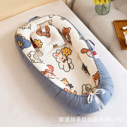 Réducteur de lit bébé pour voyage