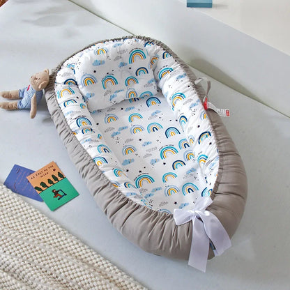 Réducteur de lit bébé pour voyage