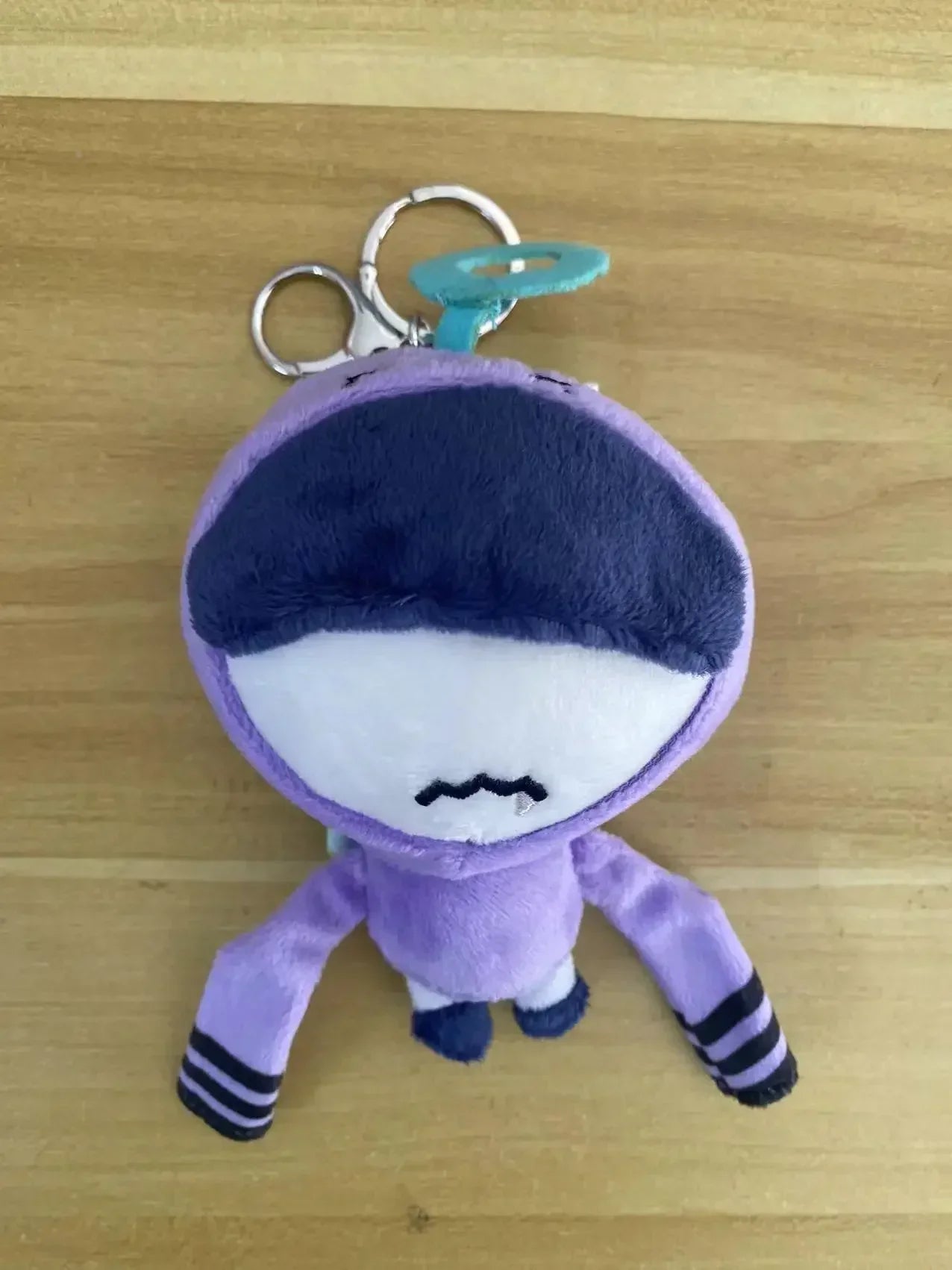 Peluche bébé en porte-clés
