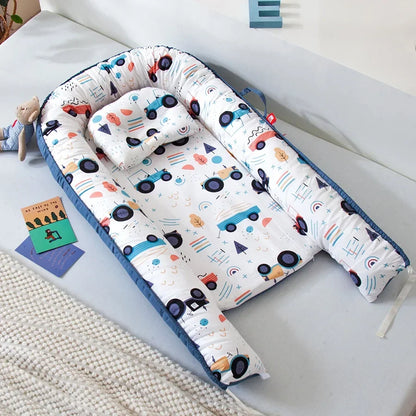 Réducteur de lit bébé pour voyage