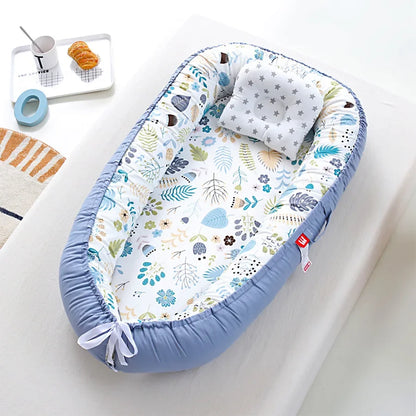 Réducteur de lit bébé pour voyage