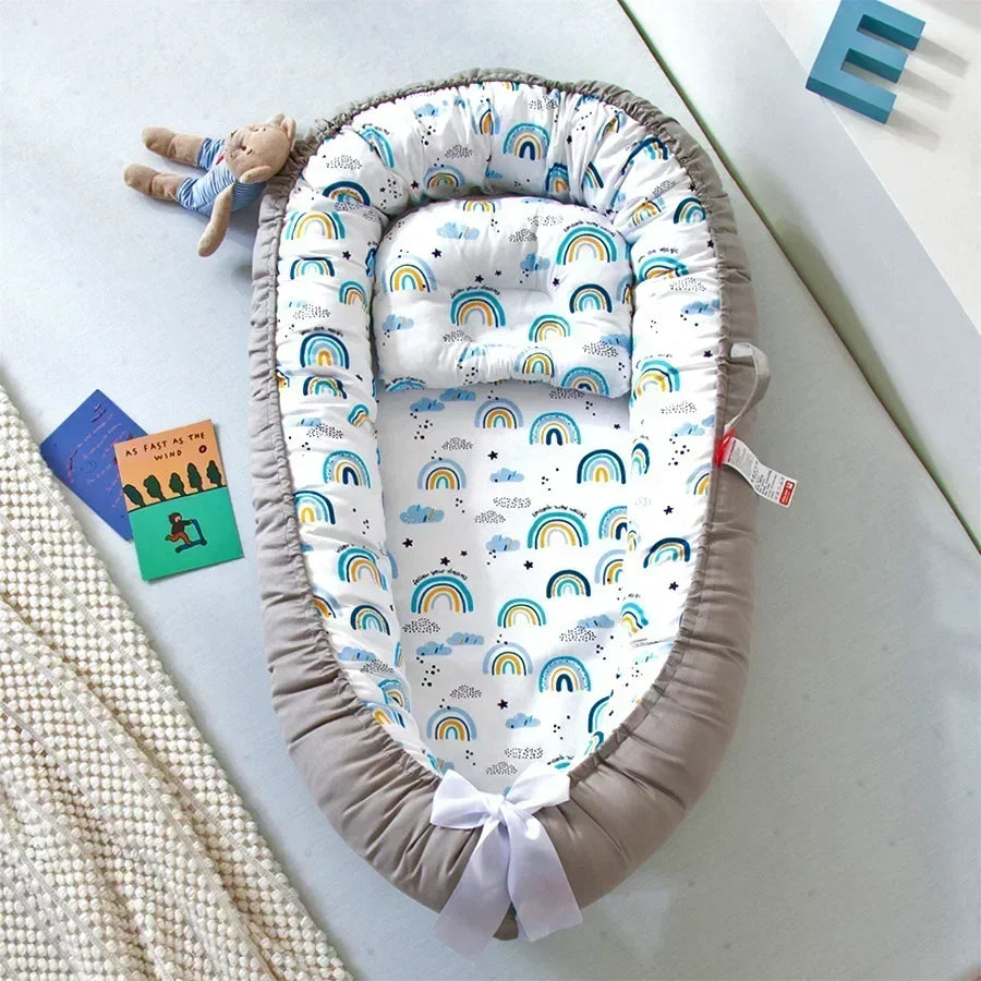 Réducteur de lit bébé pour voyage