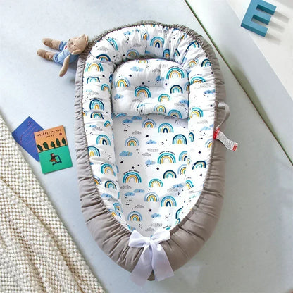 Réducteur de lit bébé pour voyage