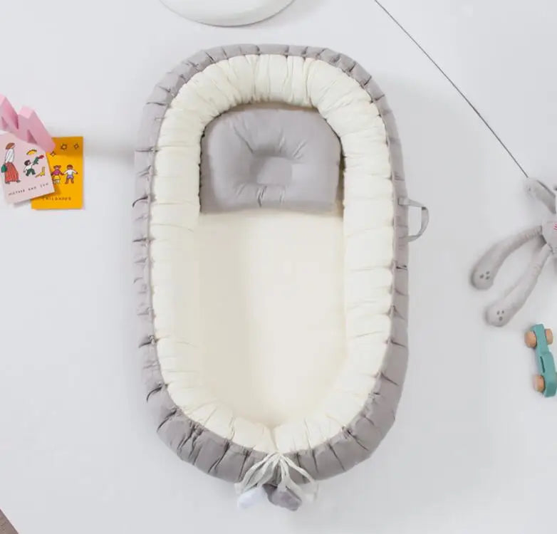 Réducteur de lit bébé 85x50cm