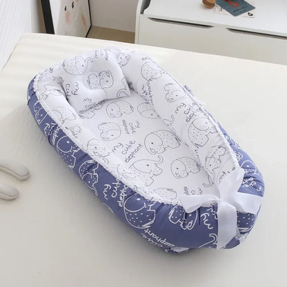 Réducteur de lit bébé pour voyage