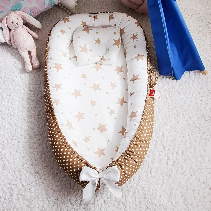Réducteur de lit bébé pour voyage