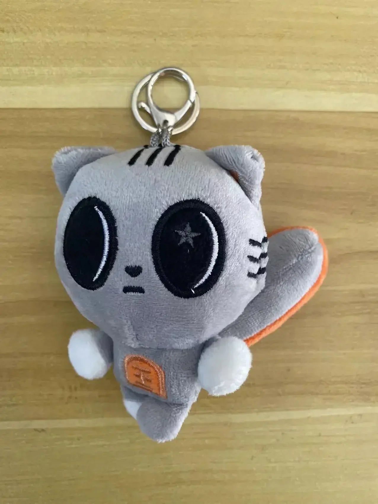 Peluche bébé en porte-clés