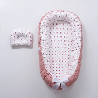 Réducteur de lit bébé pour voyage