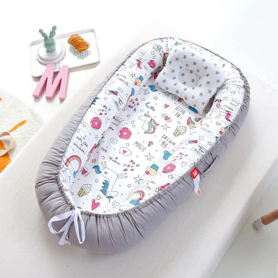 Réducteur de lit bébé pour voyage