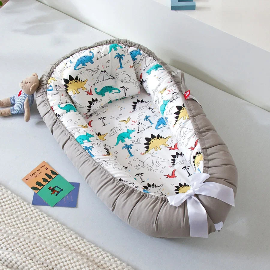 Réducteur de lit bébé pour voyage