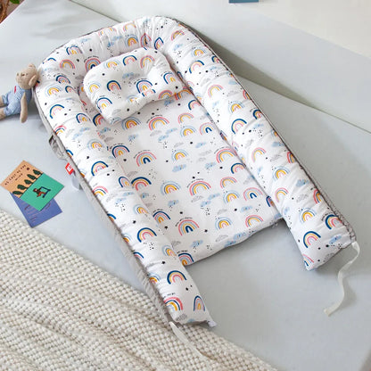 Réducteur de lit bébé pour voyage