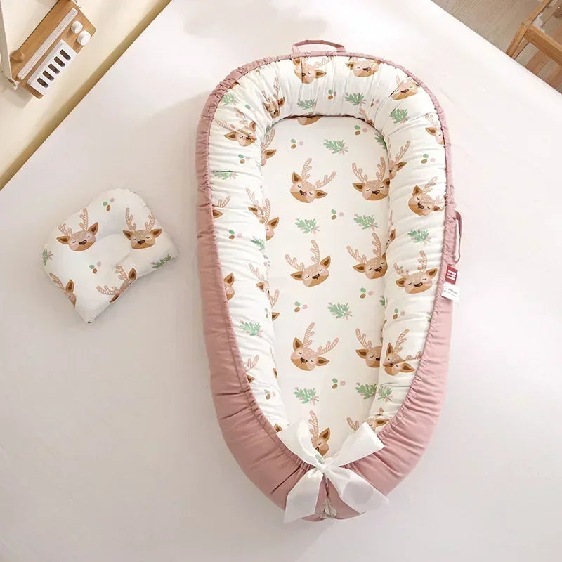 Réducteur de lit bébé pour voyage