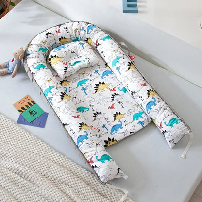 Réducteur de lit bébé pour voyage