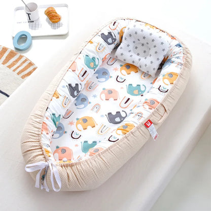 Réducteur de lit bébé pour voyage