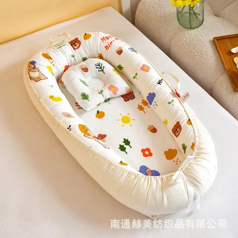 Réducteur de lit bébé pour voyage
