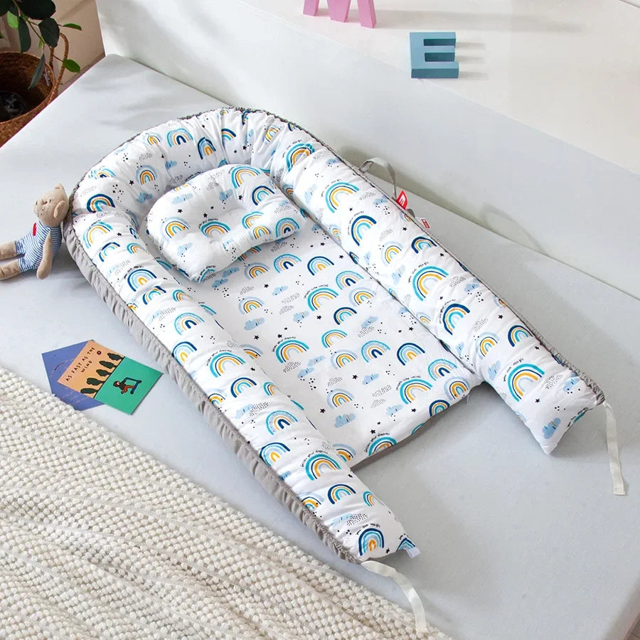 Réducteur de lit bébé pour voyage