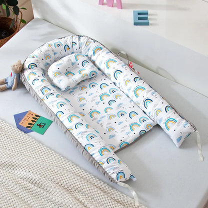 Réducteur de lit bébé pour voyage