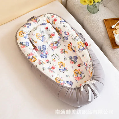 Réducteur de lit bébé pour voyage