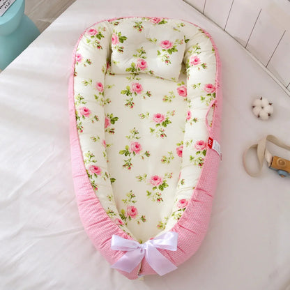 Réducteur de lit bébé pour voyage
