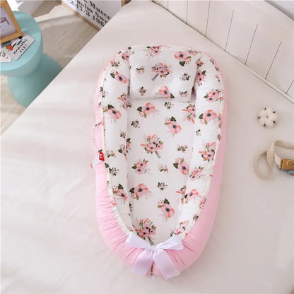 Réducteur de lit bébé pour voyage