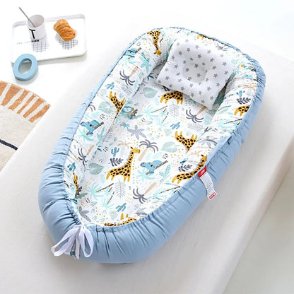 Réducteur de lit bébé pour voyage