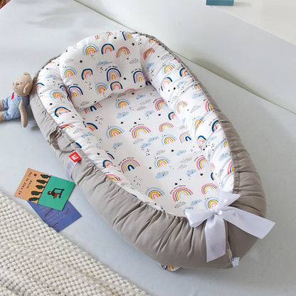 Réducteur de lit bébé pour voyage