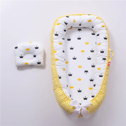 Réducteur de lit bébé pour voyage