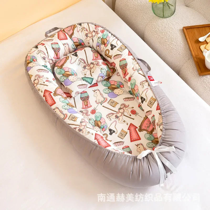 Réducteur de lit bébé pour voyage