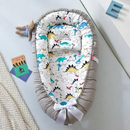 Réducteur de lit bébé pour voyage