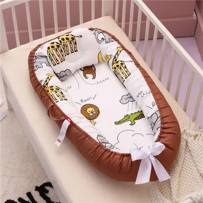 Réducteur de lit bébé pour voyage