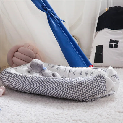 Réducteur de lit bébé 85x50cm