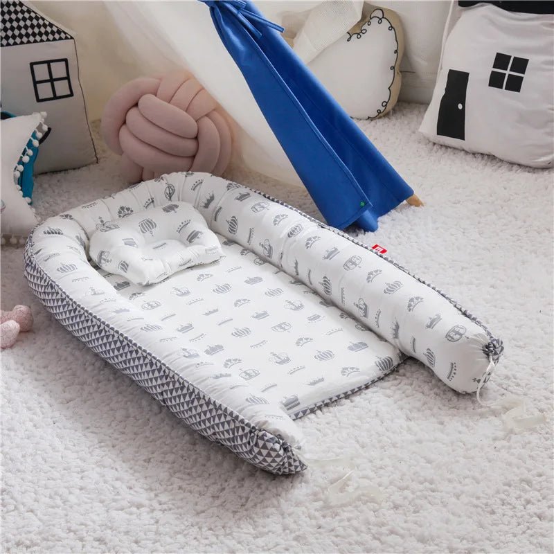 Réducteur de lit bébé en lit portable - Chambre de Bébé Idéale