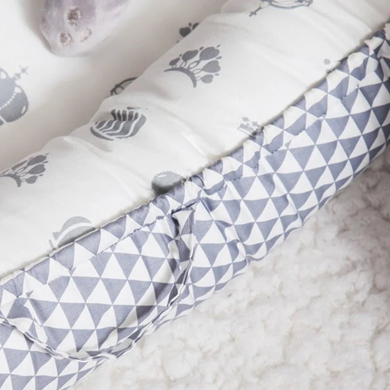 Réducteur de lit bébé en lit portable - Chambre de Bébé Idéale