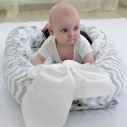 Réducteur de lit bébé en lit portatif blanc rayé