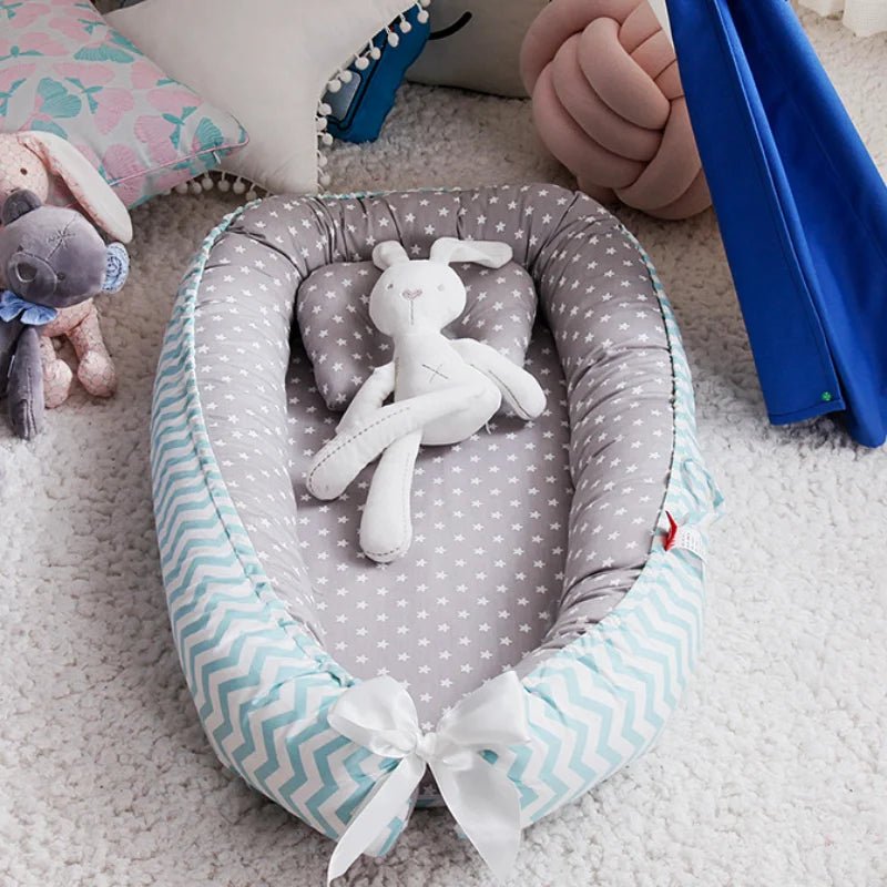 Réducteur de lit bébé en lit portatif gris peluche